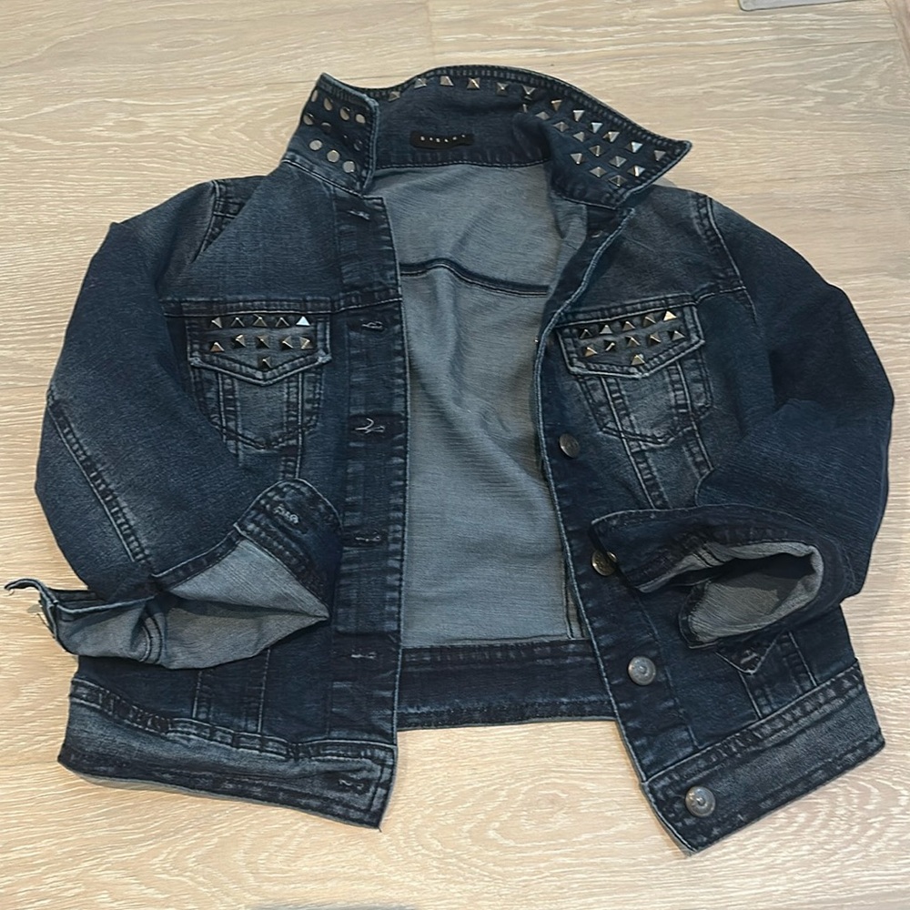 Cropped 90’s style jean jacket with studs.